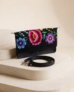 CARTERA VIAJERA FLOR ANDINA NEGRO